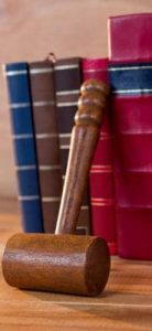 Law books with gavel